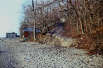 Erosion at base of old beach road